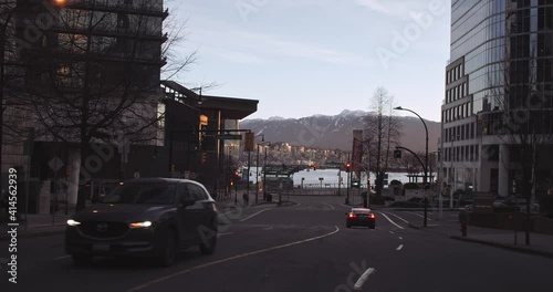 Wallpaper Mural Downtown City Morning Intersection at Sunrise with Cars and Mountains and Water in Background Vancouver Canada Torontodigital.ca