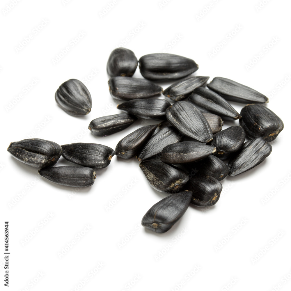 Sunflower seeds isolated on white background close up Sunflower seeds isolated on white background close up
