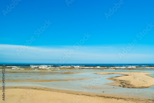 seashore  in the photo sea water against the blue sky