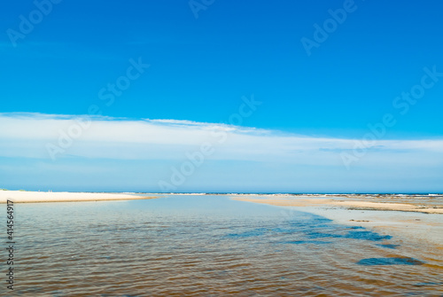 seashore  in the photo sea water against the blue sky