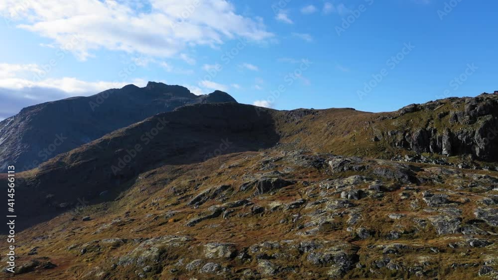 Amazing view of the mountain top along the Kvalvika beach hiking trail through the fjords and mountains in Lofoten, Norway. Amazing view of the mountain top along the Kvalvika beach hiking trail through the fjords and mountains in Lofoten, Norway.