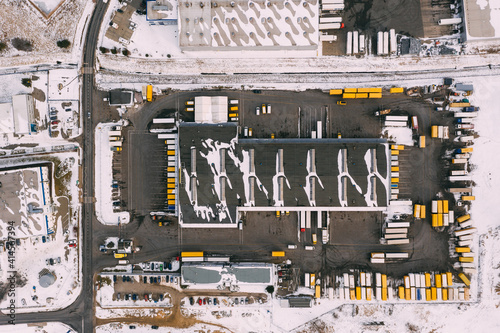 Aerial view of the distribution center, drone photography of the industrial logistic zone.