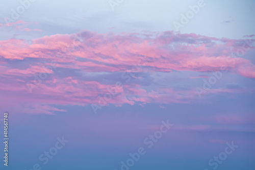 Graphic resource of a blue sky day with pink, sunrise, sunset clouds. Great for sky replacement, background for tranquility, heaven themed. 