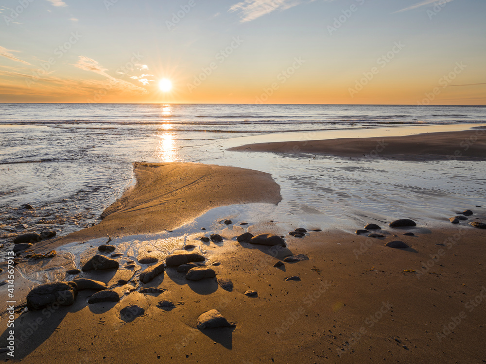 Sunset at the coast of Skalavik. The Westfjords (Vestfirdir) in Iceland.