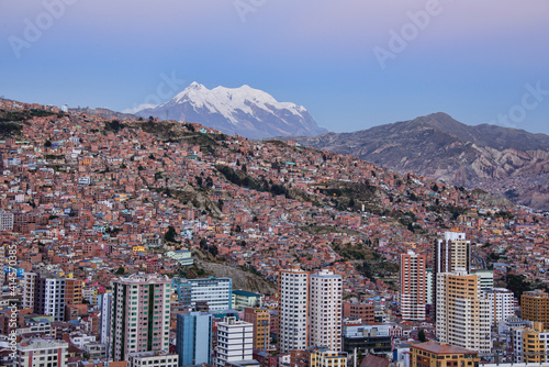 Sunset view with Illimani towering over the density of La Paz, Bolivia