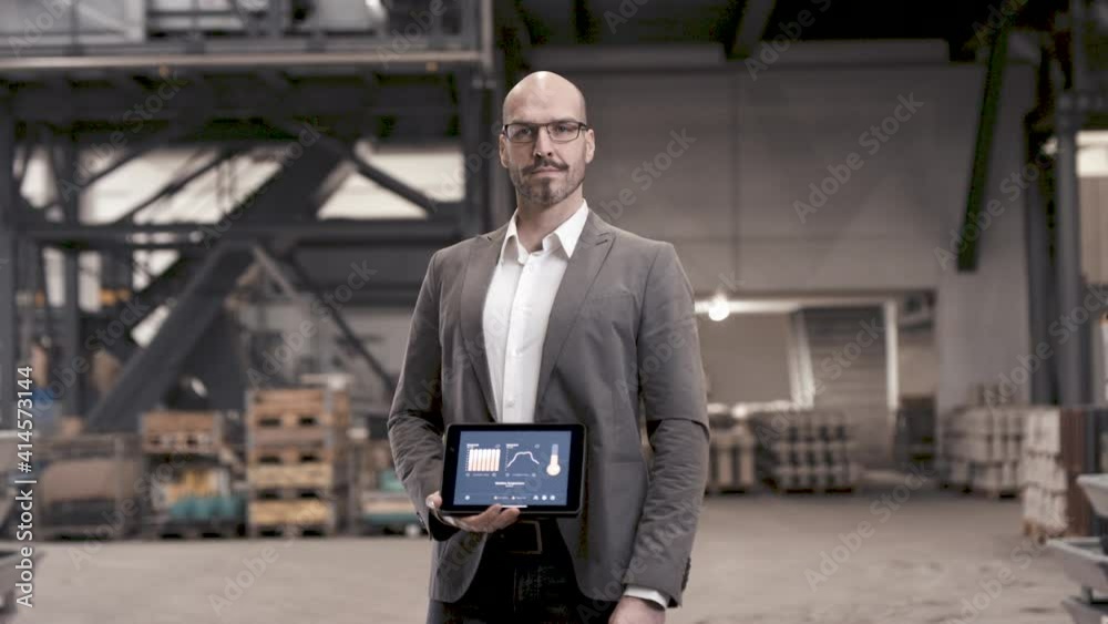 Proud business man with an analytics app Proud business man with an analytics app