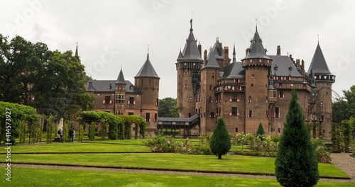 Looking at Castle De Haar across the castle grounds on an overcast  rainy day in the Netherlands  a small panorama.