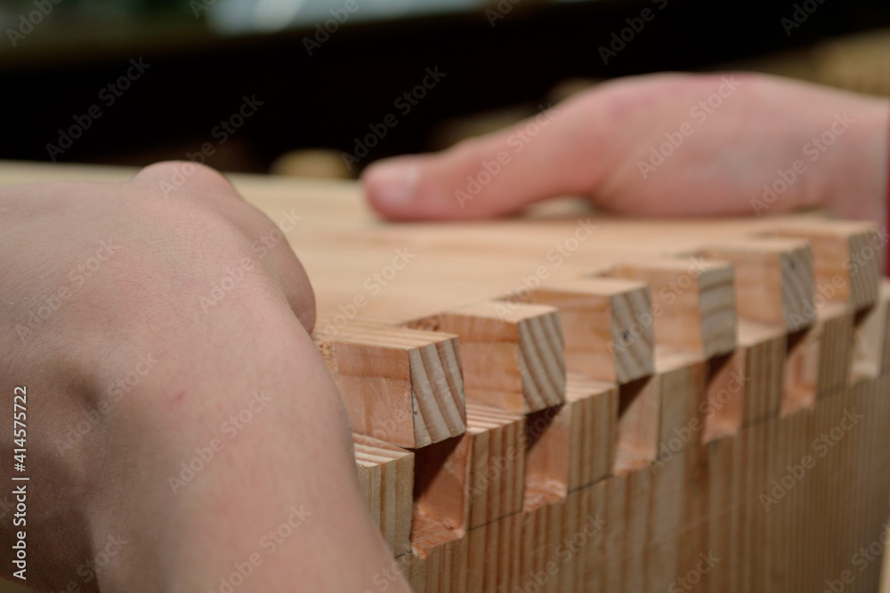 Joiner Joins Two Pieces Of Wood With Finger Joints