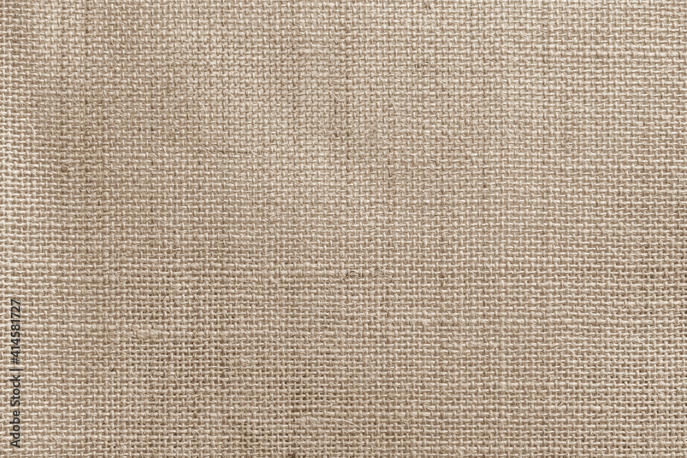 Jute hessian sackcloth canvas woven texture pattern background in light beige cream brown color blank empty Jute hessian sackcloth canvas woven texture pattern background in light beige cream brown color blank empty