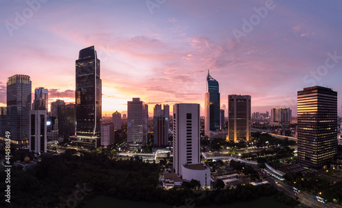 Dramatic aerial panorama of the sunset over Jakarta business and financial district in Indonesia capital city