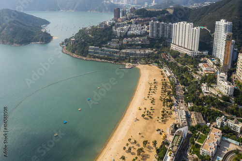 Aerial view of the famous Repulse Bay beach in Hong kong island by the south China Sea in Hongkong. Thie waterfront is lined with tall residential tower