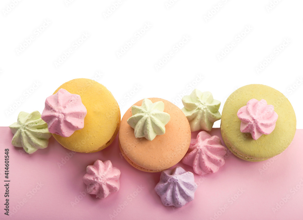 Dessert cake macaron or macaroon on pink background top view. Flat lay composition. Dessert cake macaron or macaroon on pink background top view. Flat lay composition.