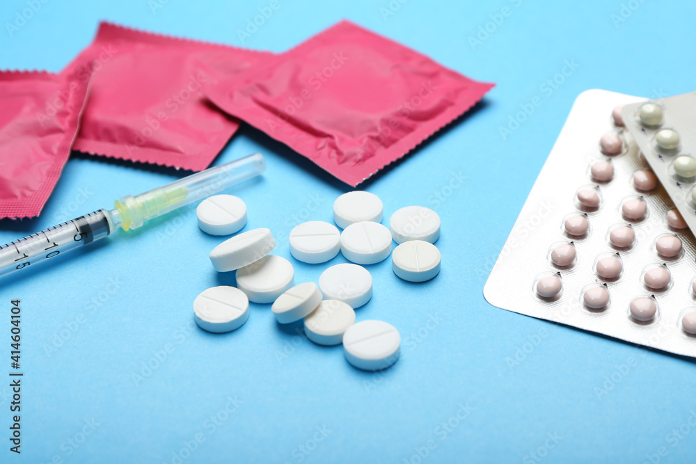 Different contraceptives on color background Different contraceptives on color background
