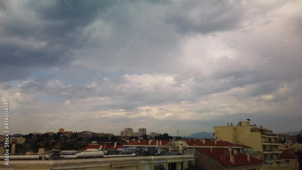 Dramatic motionlapse following clouds over skyline of Antibes, France