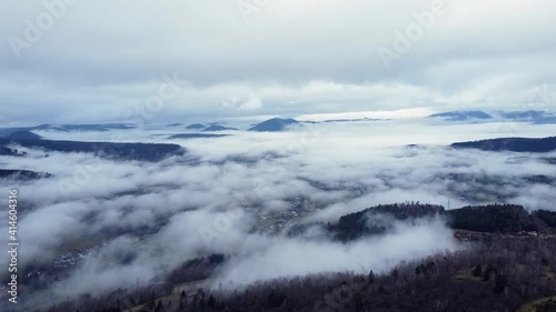 Wallpaper Mural Aerial view of low clouds with emerging mountains Torontodigital.ca