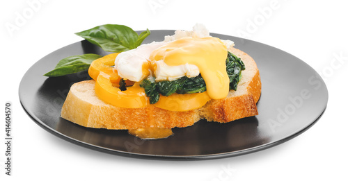 Fototapeta Plate of tasty sandwich with florentine egg on white background