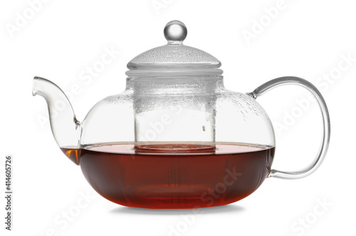 Stylish teapot with hot tea on white background