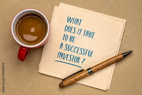 What does it take to be a successful investor? Handwriting on a napkin with a cup of coffee. Financial concept.