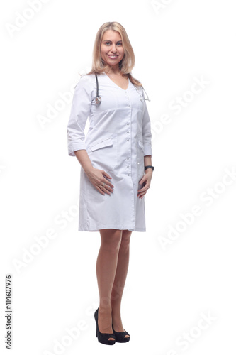 Attractive smiling doctor in white coat with stethoscope, isolated on white © ASDF