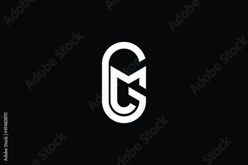GM logo letter design on luxury background. MG logo monogram initials letter concept. GM icon logo design. MG elegant and Professional letter icon design on black background. M G GM MG