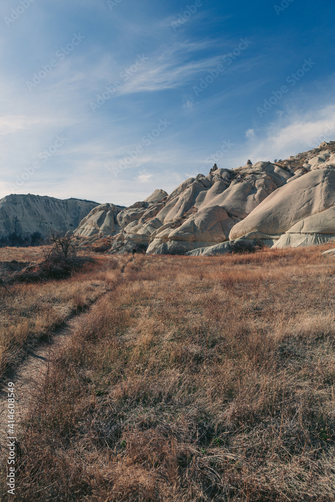 field in cappadocia with rock formations