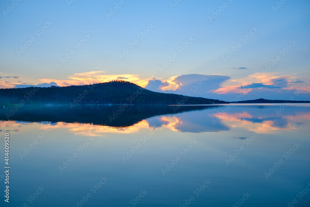 beautiful sunset with reflection on water