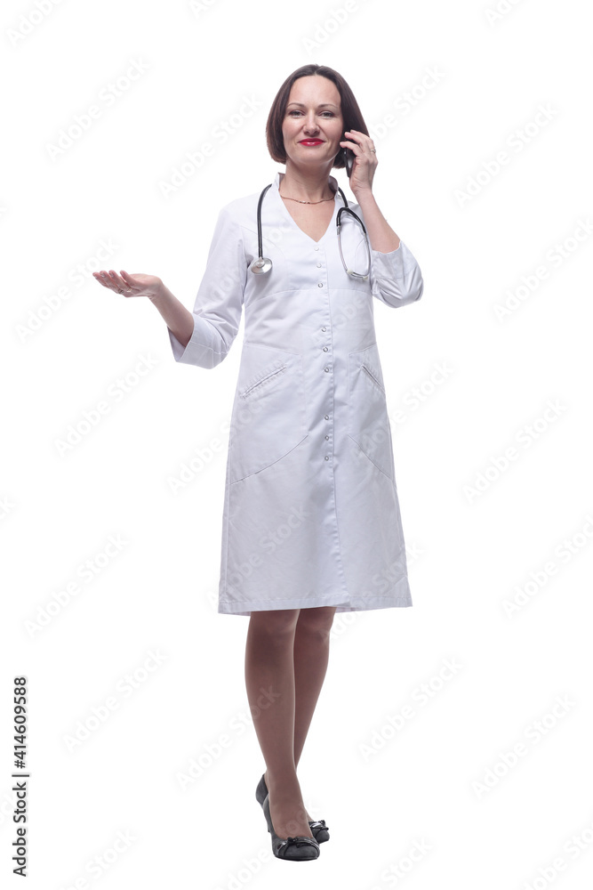 female doctor talking on a mobile phone . isolated on a white background. female doctor talking on a mobile phone . isolated on a white background.