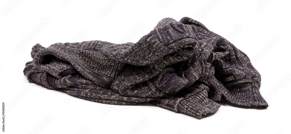 Fototapeta premium Knitted sweater on the ground