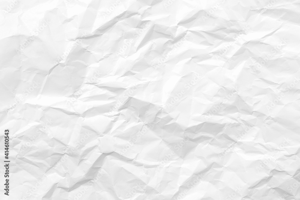 White crumpled paper texture background. Clean white paper. Top view. White crumpled paper texture background. Clean white paper. Top view.