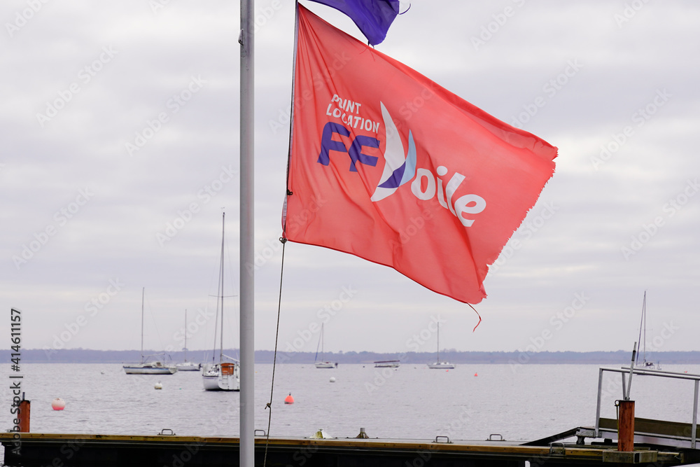 ffv ff voile French sailing federation logo and sign text on flag on cloud  sky Stock Photo | Adobe Stock