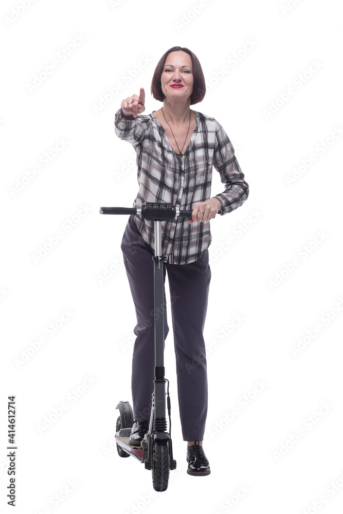 confident mature woman with electric scooter showing thumbs up. confident mature woman with electric scooter showing thumbs up.