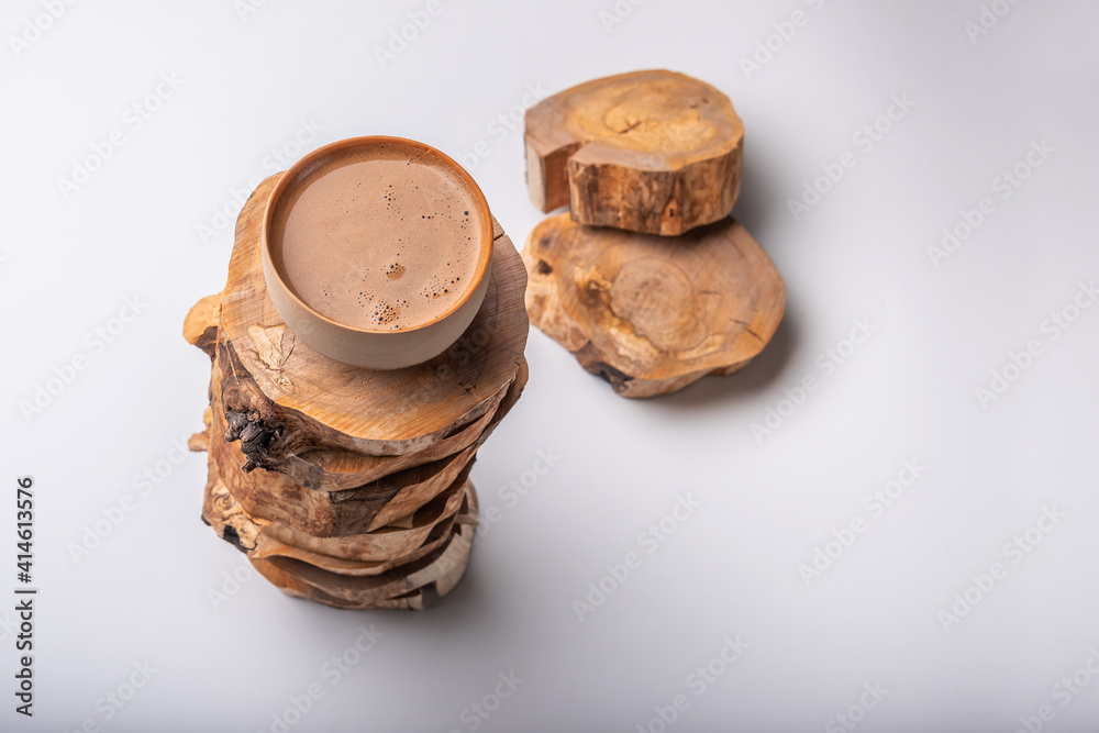 Cup of coffee on cross sections of tree. Cup of coffee on cross sections of tree.