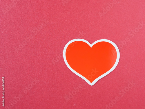 Heart shape on red paper background. The concept for love, greeting card, poster, Space for your text.
