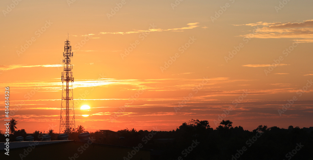 Communication Transmission tower against with sun set or sun rise