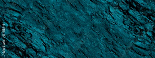 Panel kuchenny z motywem Blue green stone background. Dark turquoise toned monochrome rock texture. Close-up. Wide banner. Colorful modern background with copy space for design.