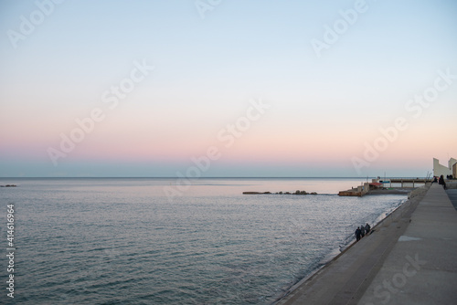 Sunset in Nova Icaria Beach in the Barcelona area on the Mediterranean on winter 2021