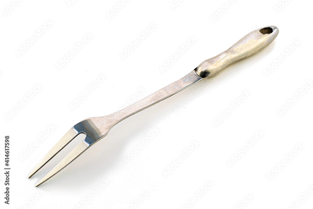 large meat fork isolated on white background large meat fork isolated on white background