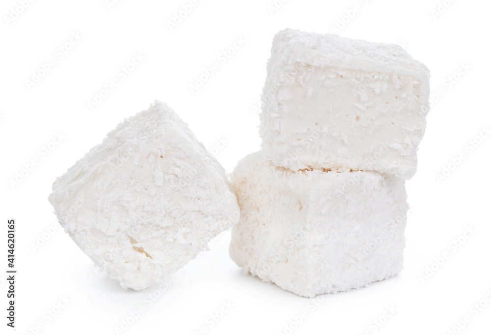 White Turkish delight with coconut shavings isolated on white White Turkish delight with coconut shavings isolated on white