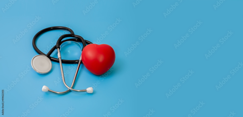 Stethoscope and heart examination red on blue background, healthcare concept. Stethoscope and heart examination red on blue background, healthcare concept.