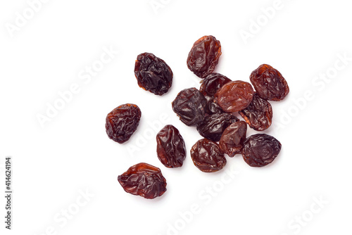 Close-up top view of Raisins isolated on white background.