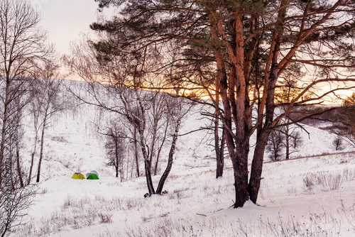 Hikers camp in the winter wilderness