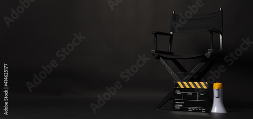 Stampa su tela Director chair and Clapper board or movie Clapperboard with yellow megaphone on black background