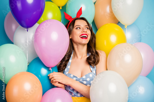 Portrait of cheerful candid girl enjoy rest relax festive bachelorette event hold blue pink air ball look copyspace feel rejoice wear retro style skirt on baloons color background