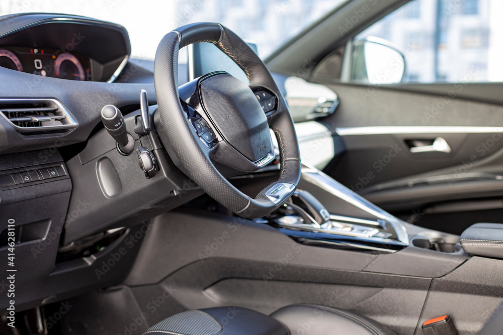 driver's seat and steering wheel of a modern fashionable car