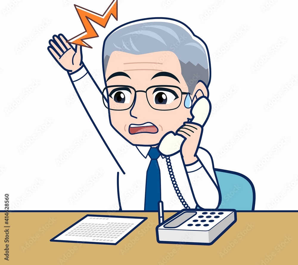 電話で営業をするサラリーマンの男性