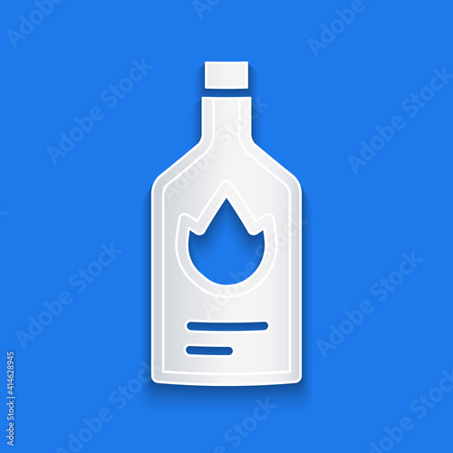 Paper cut Tabasco sauce icon isolated on blue background. Chili cayenne spicy pepper sauce. Paper art style. Vector.