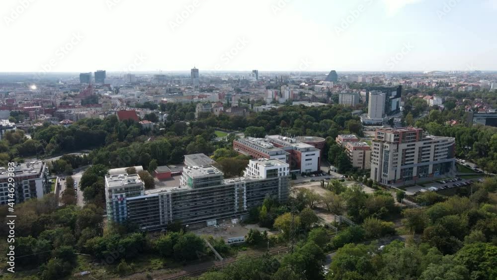 Poland with Cytadela park in the foreground. Concept of living near the nature. Poznan view from park Cytadela. City Poznan, Forest in front of the city. Poland with Cytadela park in the foreground. Concept of living near the nature. Poznan view from park Cytadela. City Poznan, Forest in front of the city.