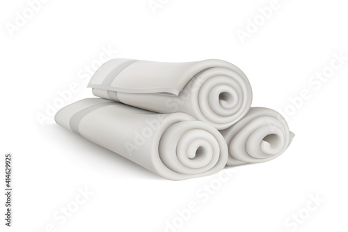 Three terry towels, rolled into tubes. 3d vector illustration