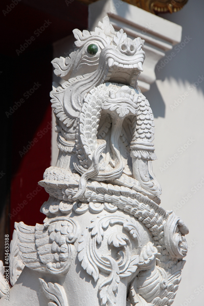 statue of a lion (?) in a buddhist temple (wat duang di) in chiang mai (thailand) 
