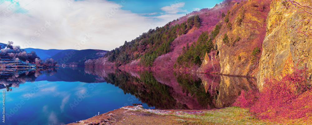 colored landscape in the mountains with lake